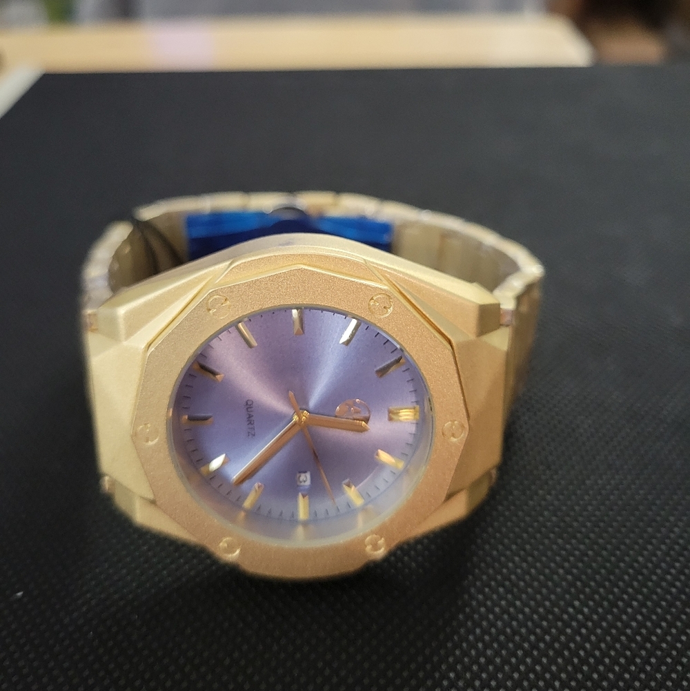 Gold-Tone Watch with Light Blue Sunburst Dial